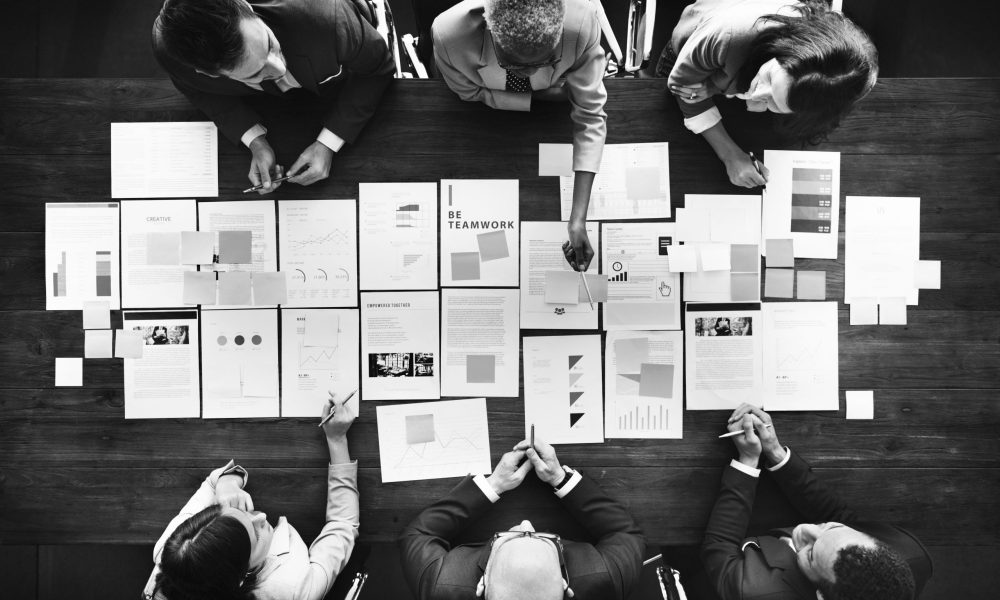 Business People Analyzing Statistics Financial Concept